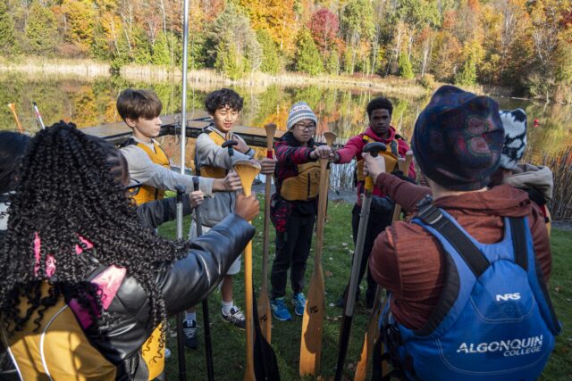 Group of young people at Trails cheering